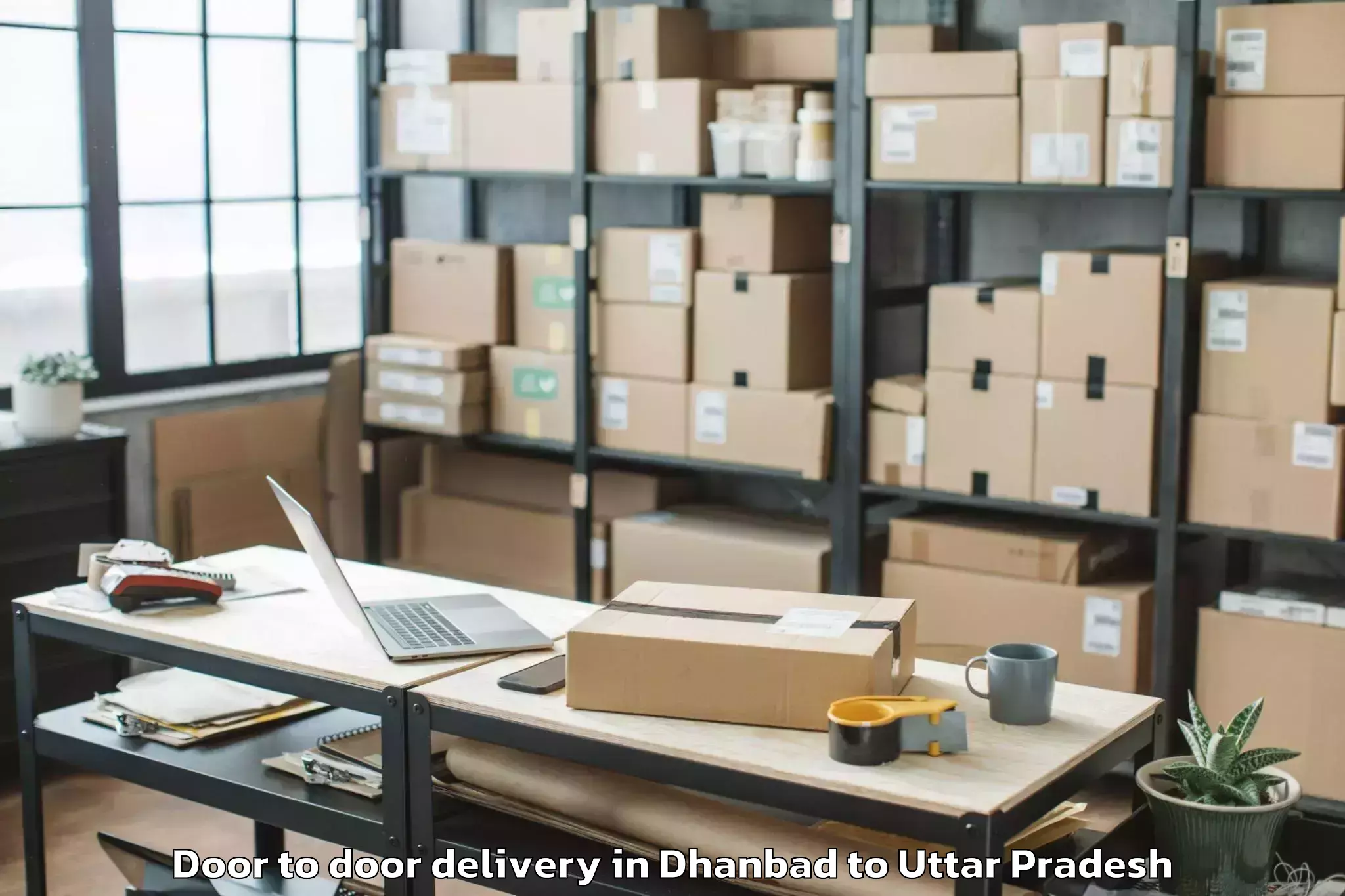 Dhanbad to Gahmar Door To Door Delivery Booking